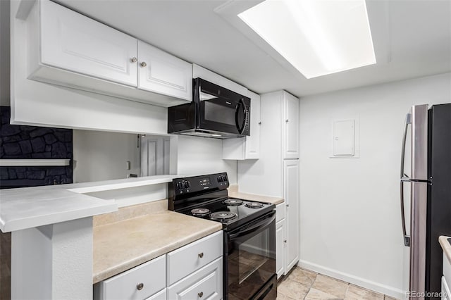 910 S Walden St Unit 106, Aurora, CO 80017 - kitchen featuring black appliances, white cabinets, and light countertops