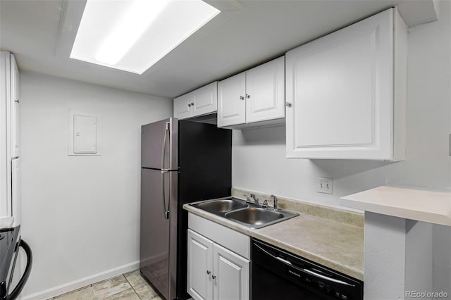 910 S Walden St Unit 106, Aurora, CO 80017 - kitchen with black dishwasher, a sink, white cabinetry, light countertops, and baseboards