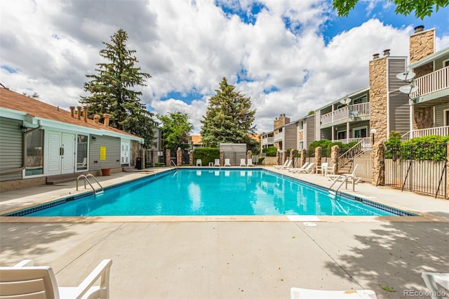 910 S Walden St Unit 106, Aurora, CO 80017 - community pool featuring a patio