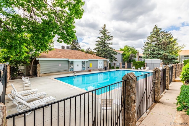 910 S Walden St Unit 106, Aurora, CO 80017 - community pool featuring a patio