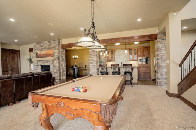 28800 Stonecrop Trl, Conifer, CO 80433 - recreation room featuring light colored carpet, a stone fireplace, billiards, recessed lighting, and bar