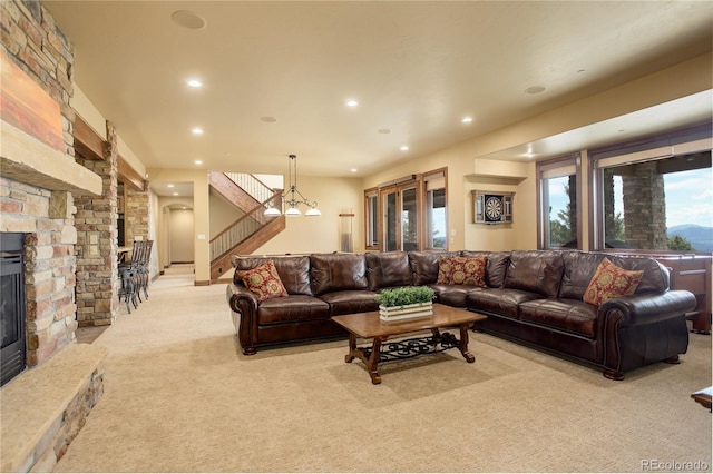 28800 Stonecrop Trl, Conifer, CO 80433 - living room with light carpet, a fireplace, recessed lighting, and stairway