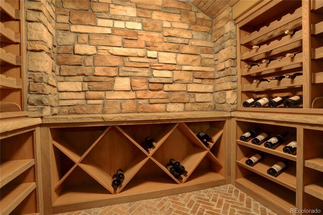 28800 Stonecrop Trl, Conifer, CO 80433 - wine area featuring brick floors