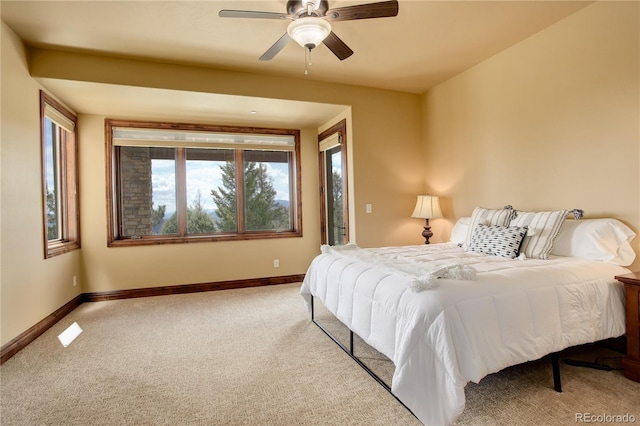 28800 Stonecrop Trl, Conifer, CO 80433 - carpeted bedroom featuring baseboards and ceiling fan