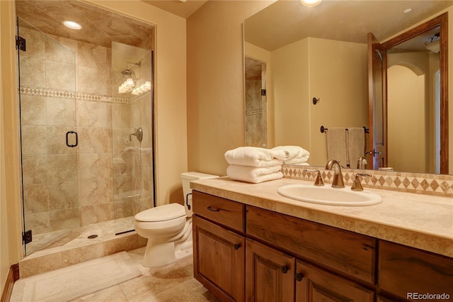 28800 Stonecrop Trl, Conifer, CO 80433 - full bath with a shower stall, toilet, and vanity