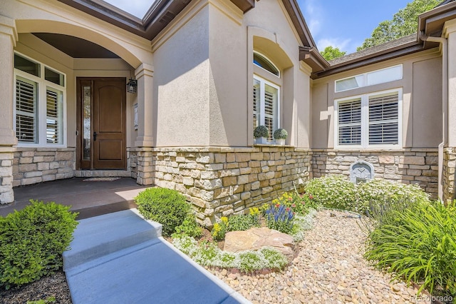 11070 Meade Ct, Westminster, CO 80031 - doorway to property with stone siding and stucco siding