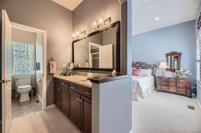 11070 Meade Ct, Westminster, CO 80031 - bathroom featuring vanity and a shower with door