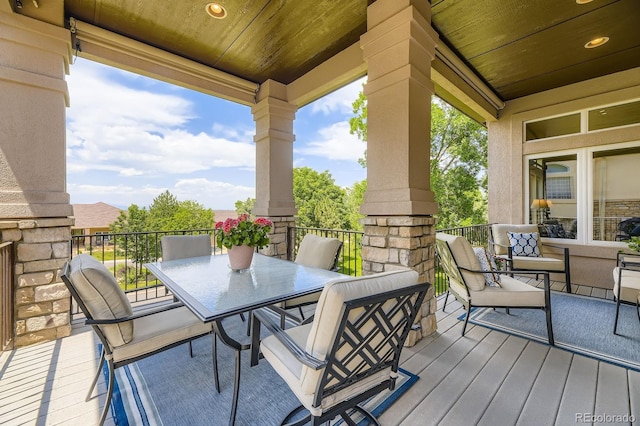 11070 Meade Ct, Westminster, CO 80031 - wooden terrace with outdoor dining area