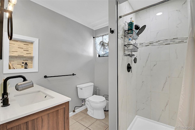 bathroom with a stall shower, tile patterned flooring, vanity, and toilet