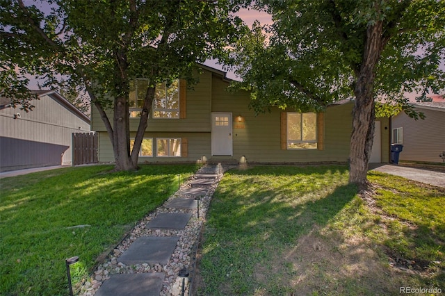 view of front of home with a lawn