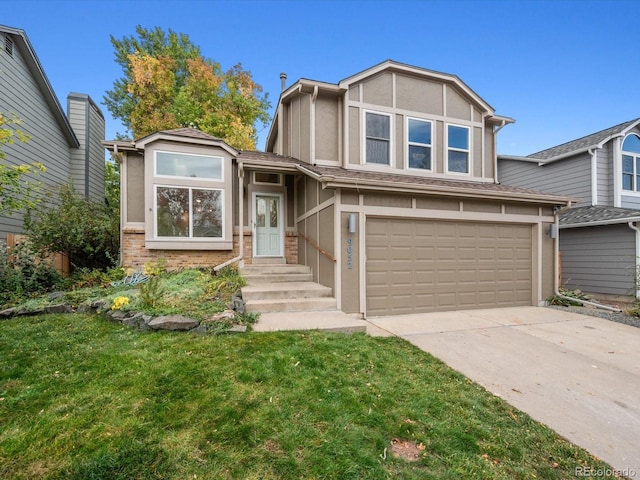 view of front facade featuring a garage and a front yard