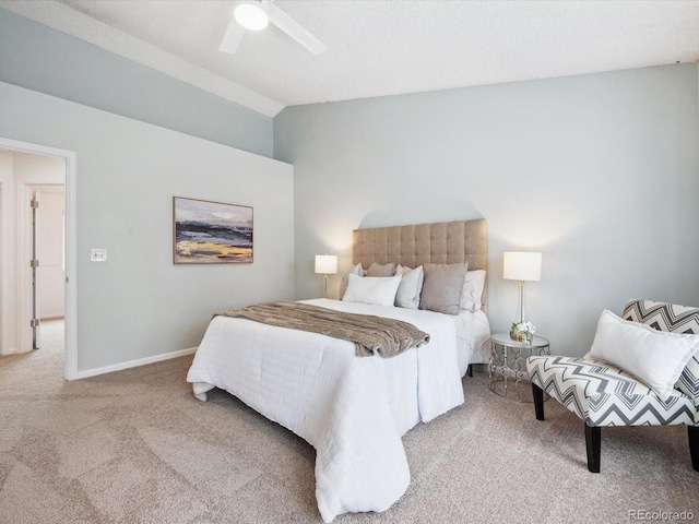 carpeted bedroom featuring ceiling fan and lofted ceiling