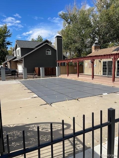 view of pool featuring a patio area