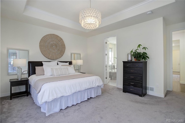 bedroom featuring a tray ceiling, carpet flooring, baseboards, and a chandelier