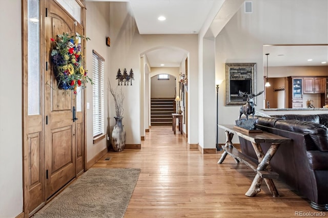 foyer with light hardwood / wood-style floors