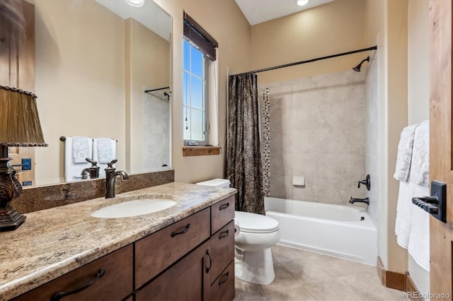 full bathroom featuring vanity, tile patterned flooring, toilet, and shower / bath combo with shower curtain