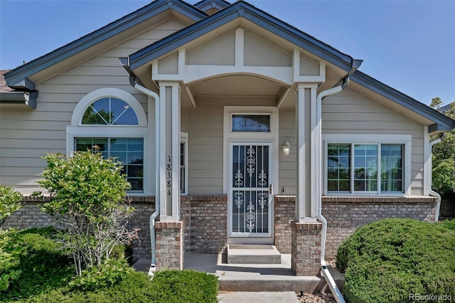 18384 E Bethany Pl, Aurora, CO 80013 - doorway to property with brick siding