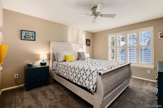 bedroom with ceiling fan and dark carpet