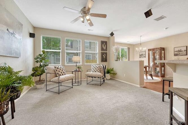 17225 Lark Water Ln Unit C, Parker, CO 80134 - living area featuring a chandelier, carpet flooring, and ceiling fan