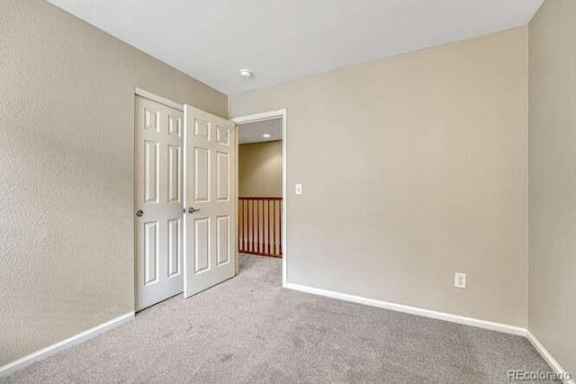17225 Lark Water Ln Unit C, Parker, CO 80134 - unfurnished bedroom featuring carpet flooring and baseboards