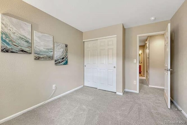 17225 Lark Water Ln Unit C, Parker, CO 80134 - unfurnished bedroom featuring carpet and a closet