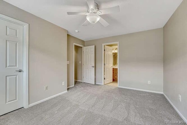 17225 Lark Water Ln Unit C, Parker, CO 80134 - unfurnished bedroom featuring carpet, connected bathroom, and a ceiling fan