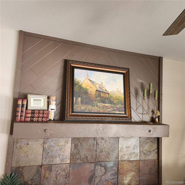 interior details featuring a textured ceiling