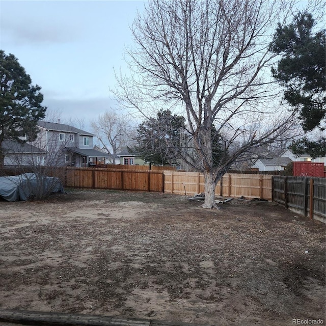 view of yard featuring a fenced backyard