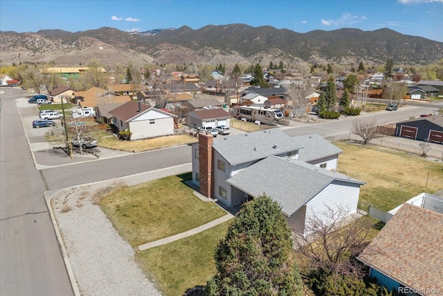 bird's eye view with a mountain view and a residential view