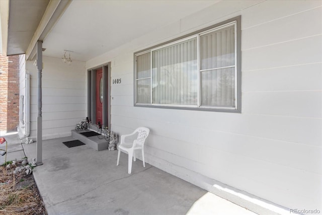 entrance to property with covered porch