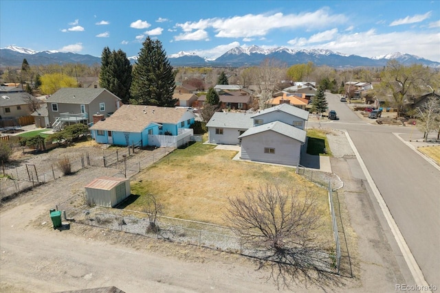 drone / aerial view with a mountain view and a residential view