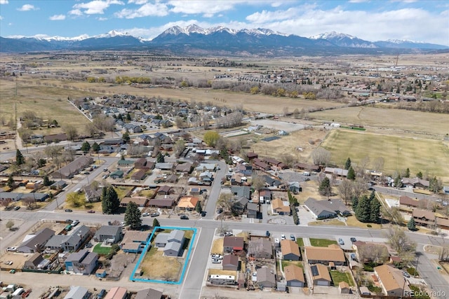 drone / aerial view with a mountain view and a residential view