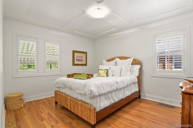 bedroom with light wood-type flooring