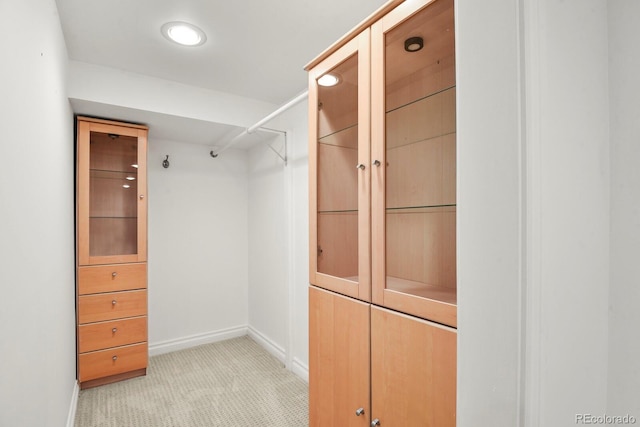 spacious closet featuring light tile patterned flooring