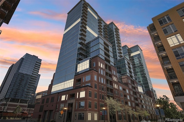 view of outdoor building at dusk