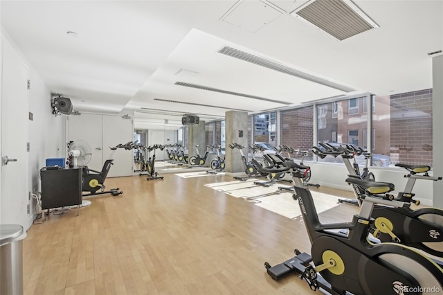 gym with light wood-type flooring