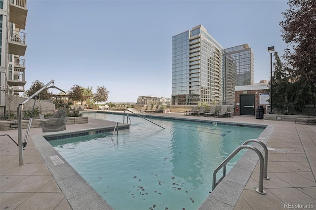 view of pool featuring a patio area