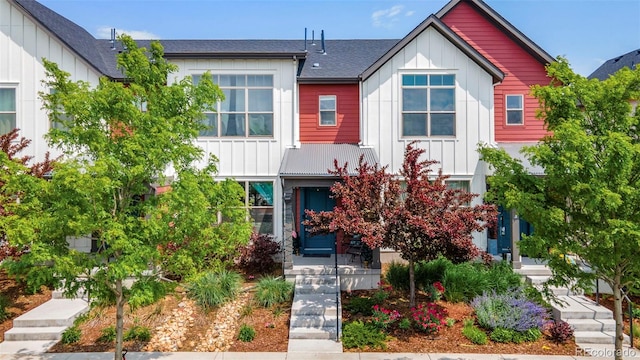 5744 Alton St, Denver, CO 80238 - view of front facade featuring board and batten siding and roof with shingles