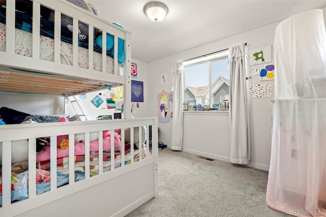 5744 Alton St, Denver, CO 80238 - bedroom featuring carpet flooring and baseboards