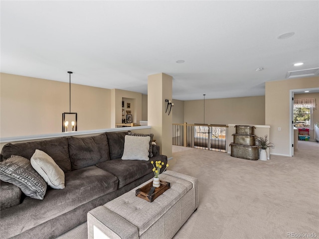 carpeted living area featuring visible vents