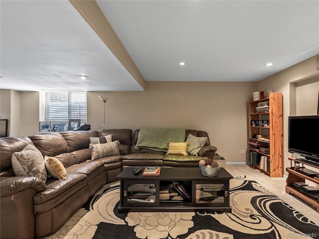 living room with recessed lighting, light carpet, and baseboards