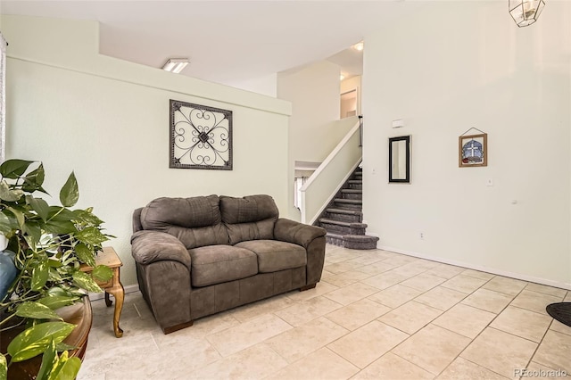 9882 Harris St, Thornton, CO 80229 - living area with stairway and light tile patterned floors