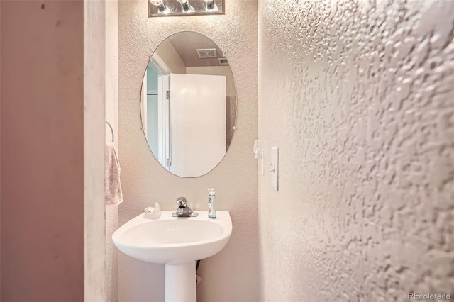9882 Harris St, Thornton, CO 80229 - bathroom featuring a sink