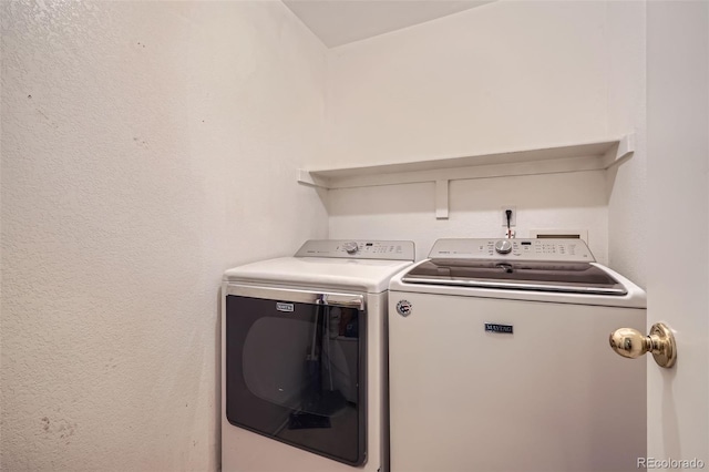 9882 Harris St, Thornton, CO 80229 - washroom with washer and clothes dryer
