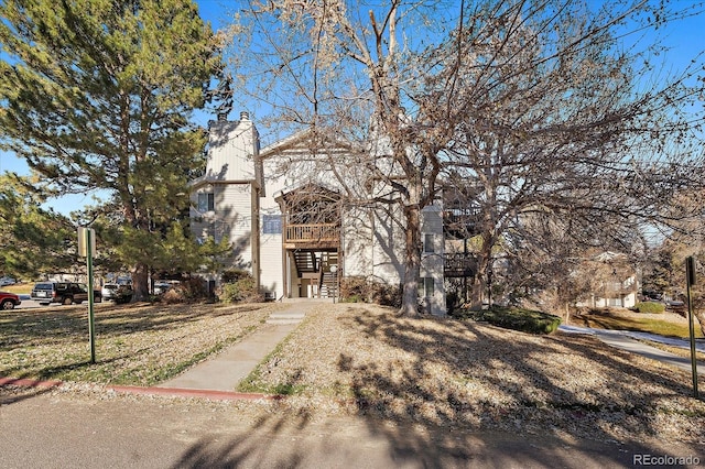 view of property hidden behind natural elements