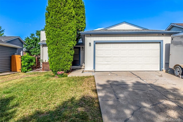 4784 S Tabor St, Morrison, CO 80465 - ranch-style home featuring driveway, a front lawn, and a garage