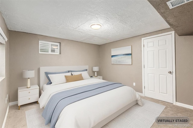 4784 S Tabor St, Morrison, CO 80465 - bedroom featuring carpet flooring and a textured ceiling