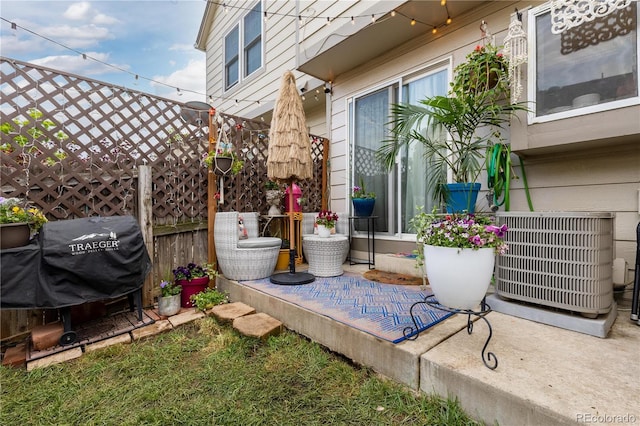 9620 W Chatfield Ave Unit D, Littleton, CO 80128 - view of patio featuring grilling area