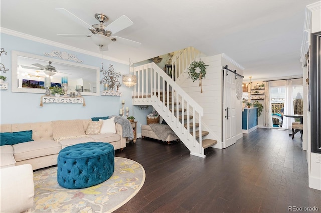 9620 W Chatfield Ave Unit D, Littleton, CO 80128 - living area featuring stairway, a barn door, a ceiling fan, hardwood / wood-style flooring, and crown molding