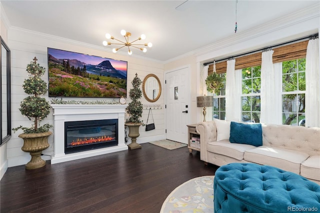 9620 W Chatfield Ave Unit D, Littleton, CO 80128 - living room featuring a chandelier, wood finished floors, crown molding, and a glass covered fireplace